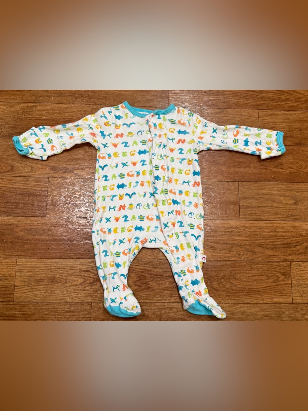 Magnetic Me White Footed Pajamas with Blue Trim and Multicolor Alphabet Print